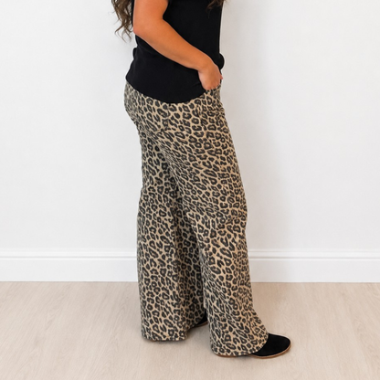 RISEN RUN THE WILD MID RISE WIDE LEG LEOPARD JEANS - SV Boutique & Co.