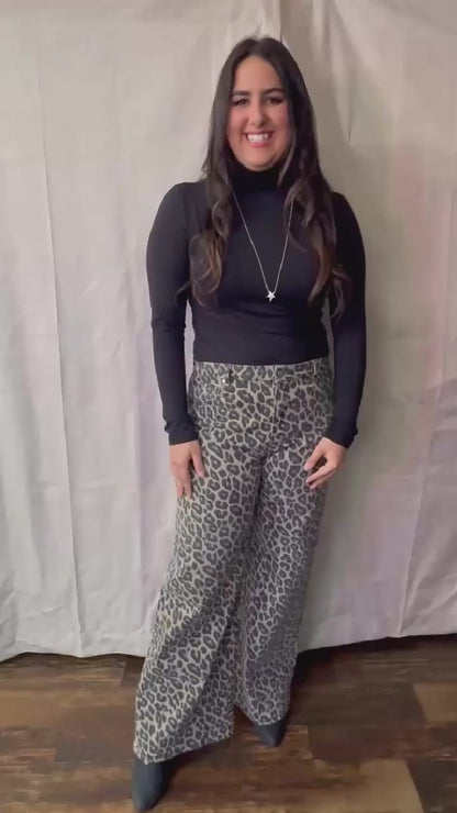 RISEN RUN THE WILD MID RISE WIDE LEG LEOPARD JEANS