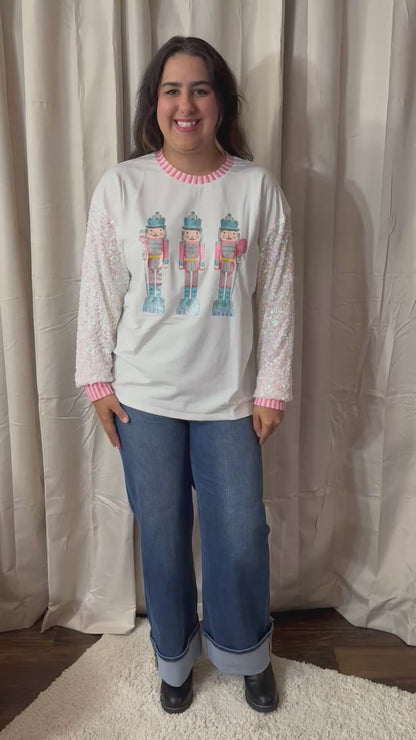 Glittery Nutcrackers on White Top with Sequin Sleeves by Emma+ Grace